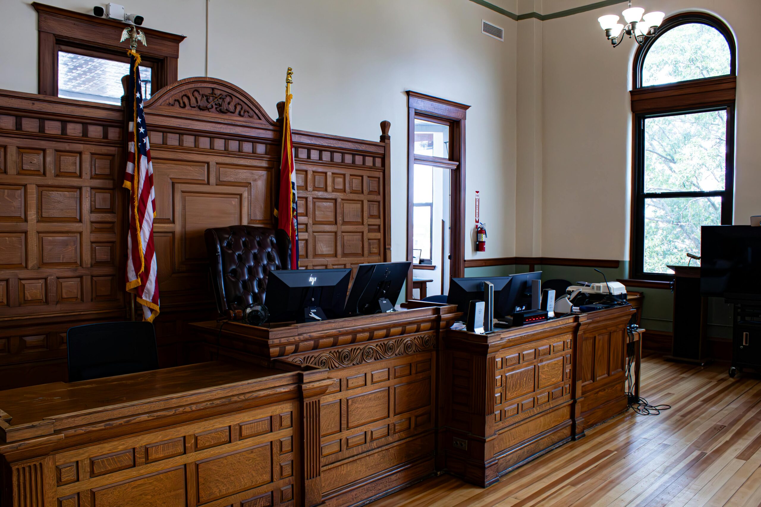 judges bench and witness stand in courtroom